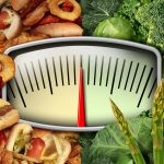 A Scale Surrounded By Healthy Foods And Fatty Foods