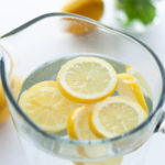 Jug Of Fresh Water With Some Lemon Slices